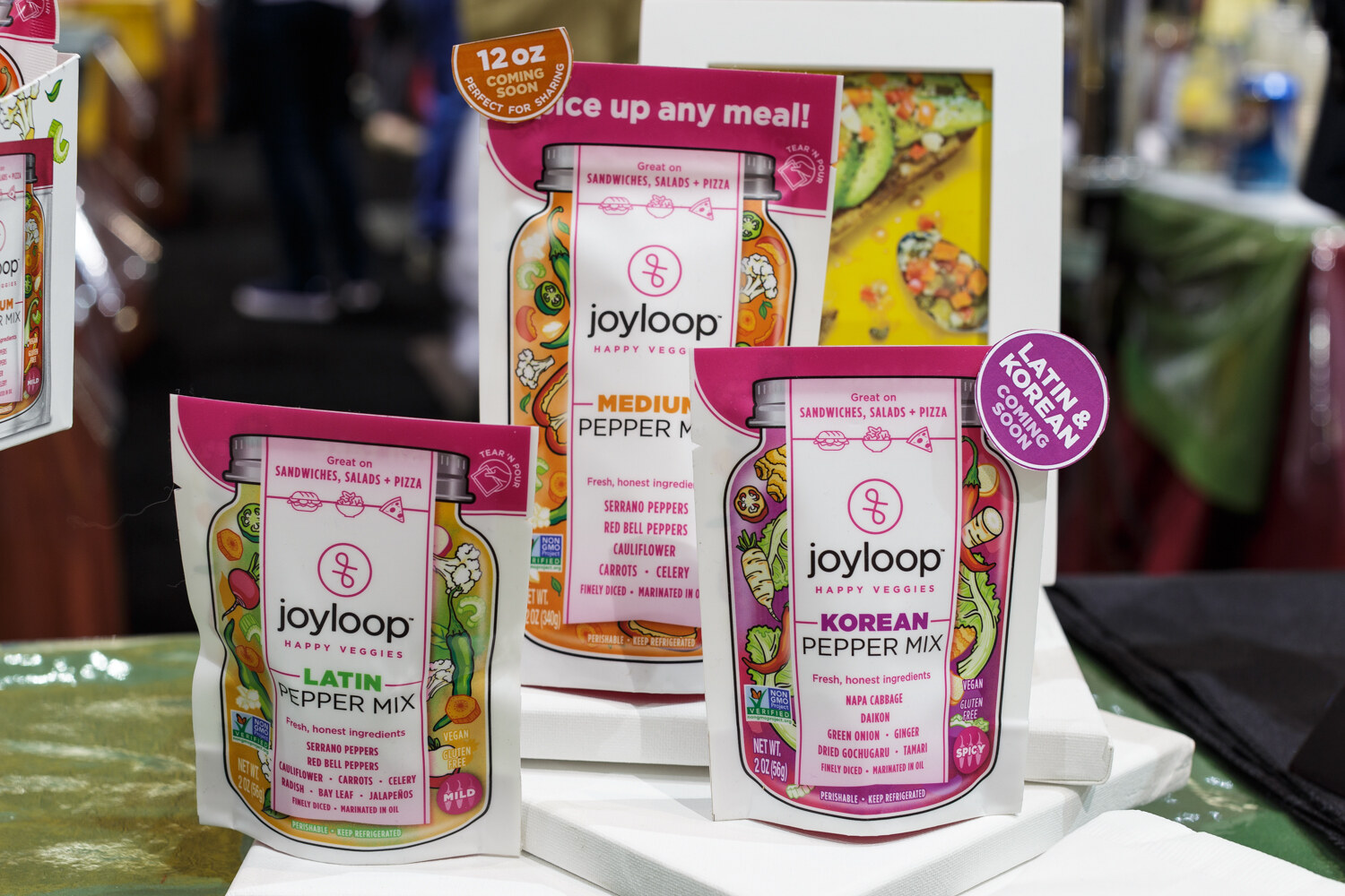 Jars of pepper mix with a boxed display.
