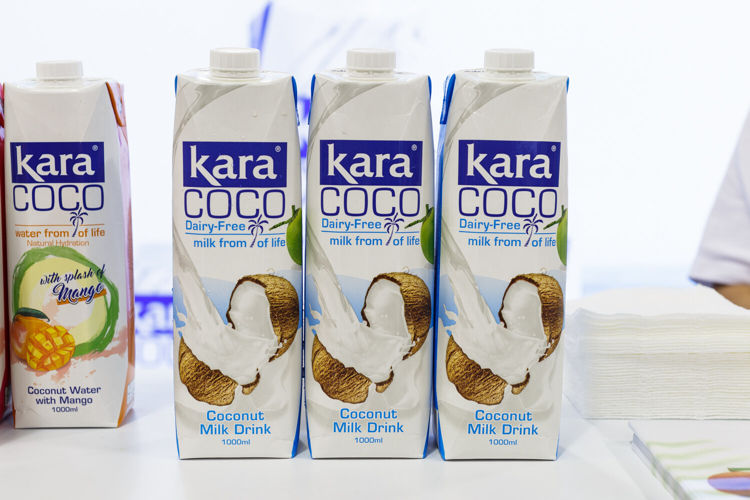 Cartons of Kara Coco coconut milk drink and coconut water with mango.