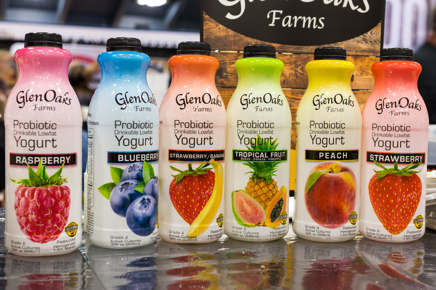 Photo of bottles of Glen Oaks Farms probiotic drinkable yogurt in six fruit flavors.