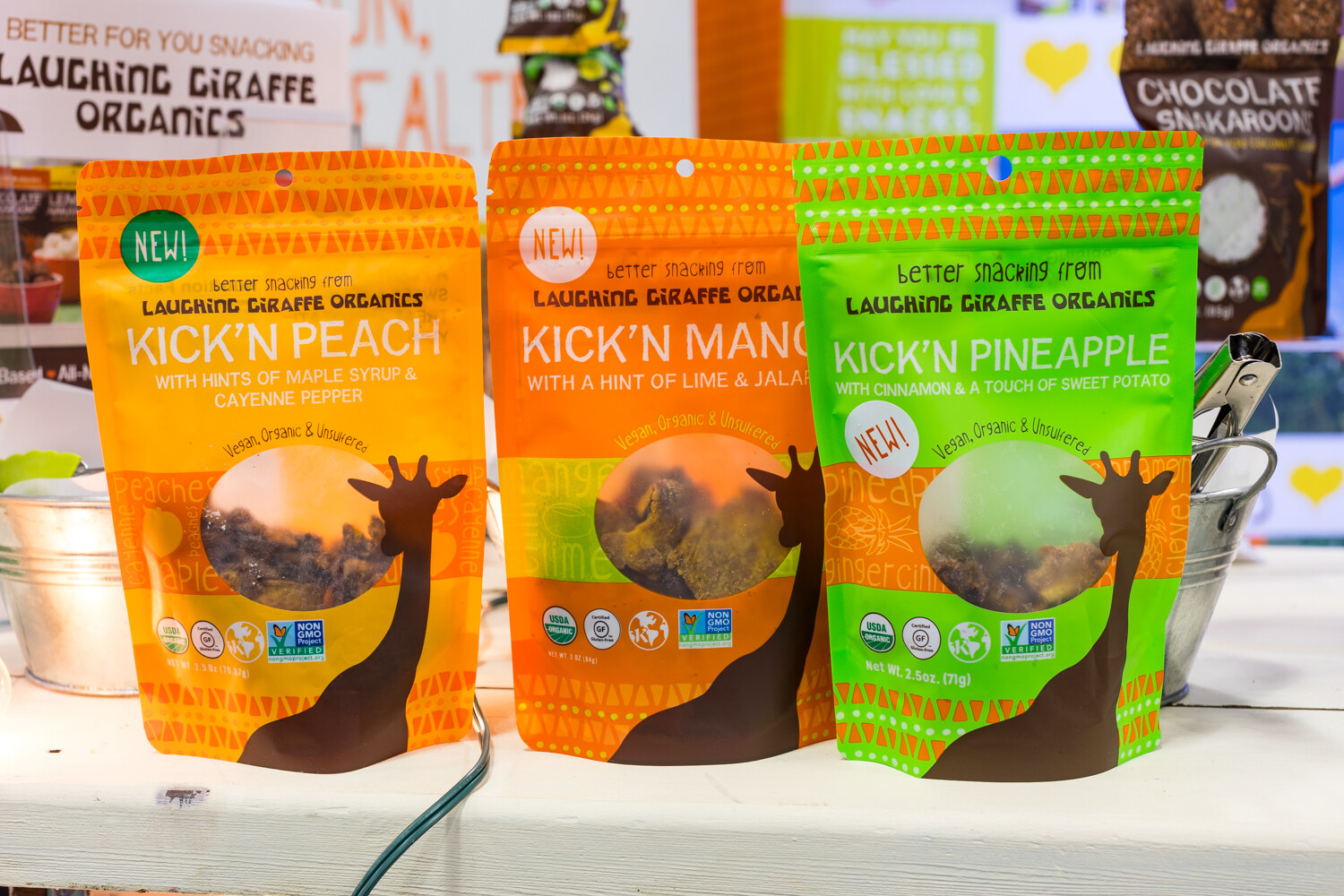 Photo of Laughing Giraffe Organics kick'n peach, mango and pineapple bags.