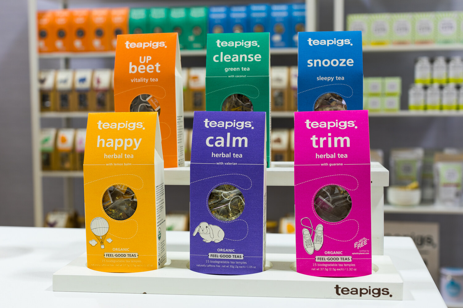 Photo of Teapigs herbal tea boxes in happy, calm and trim.
