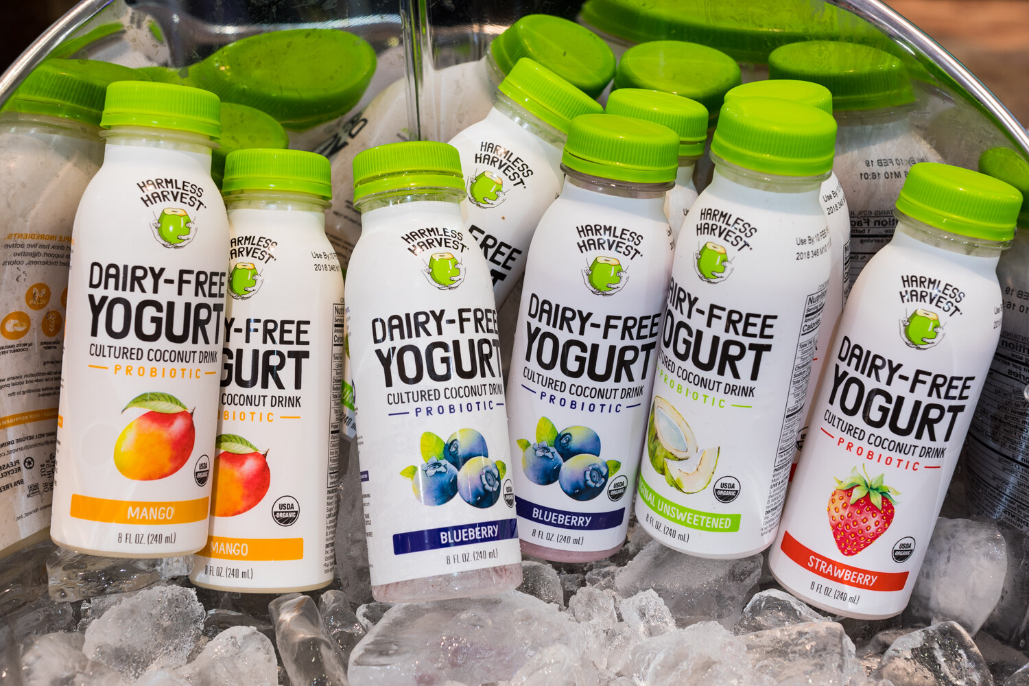 Photo of Wayless Harvest dairy-free yogurt drink bottles in ice.