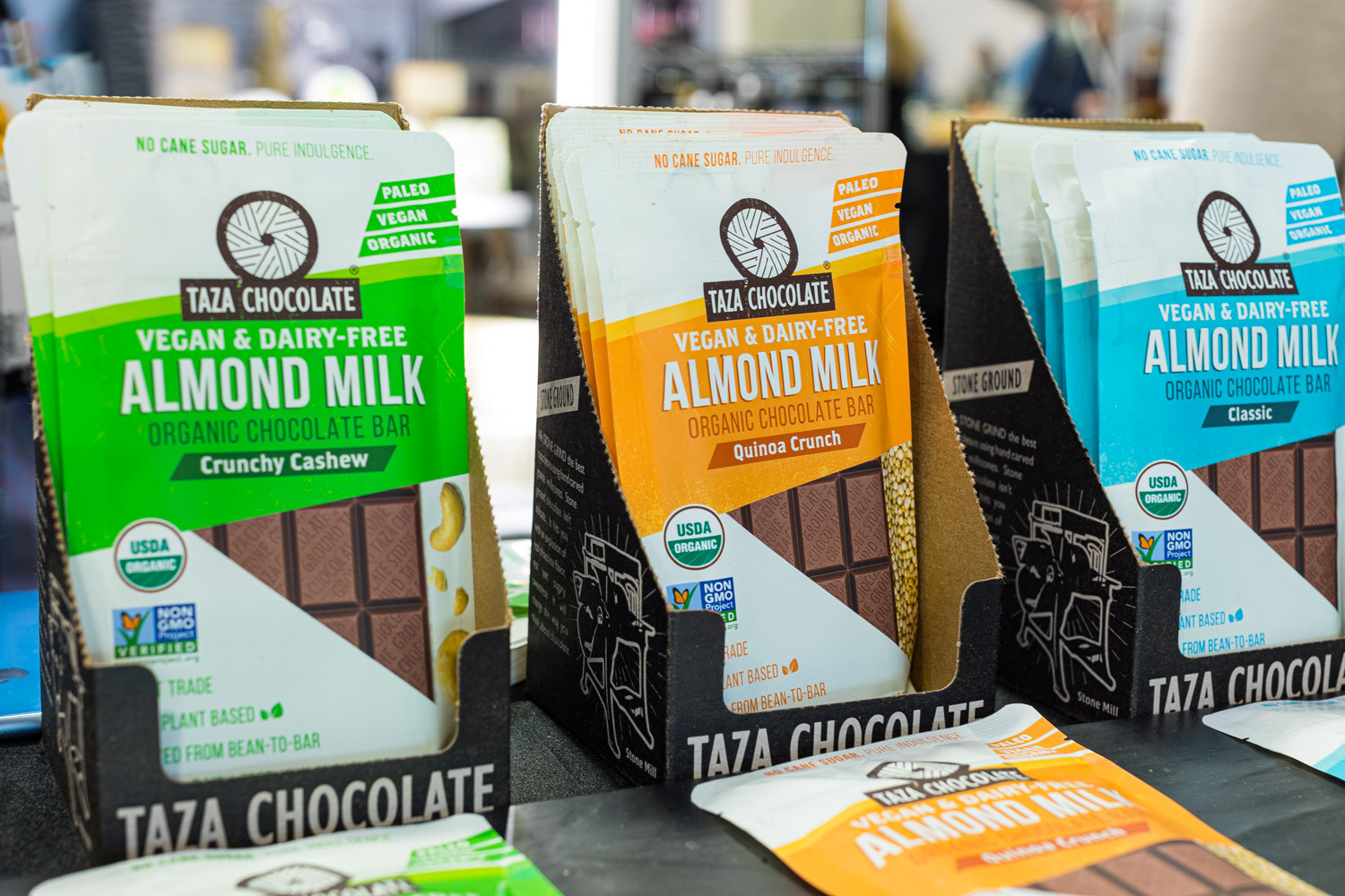 Taza Chocolate almond milk bars in crunchy cashew, quinoa crunch and classic in cardboard displays