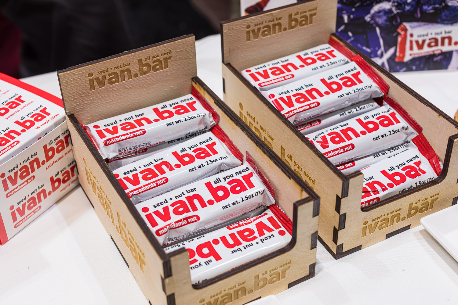 Wooden display boxes full of ivan.bar macadamia nut bars