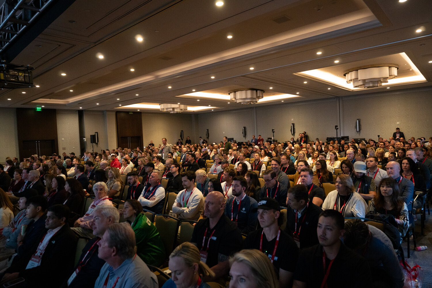 A large crowd fills the ballroom for a main-stage session.
