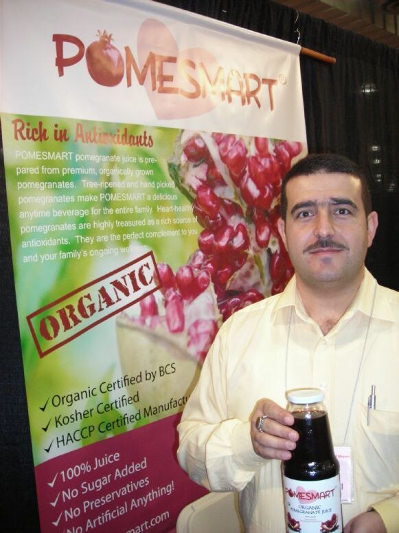 Photo unavailable. Image of Metin Deniz of Pomesmart at the Summer Fancy Foods 2007 trade show.
