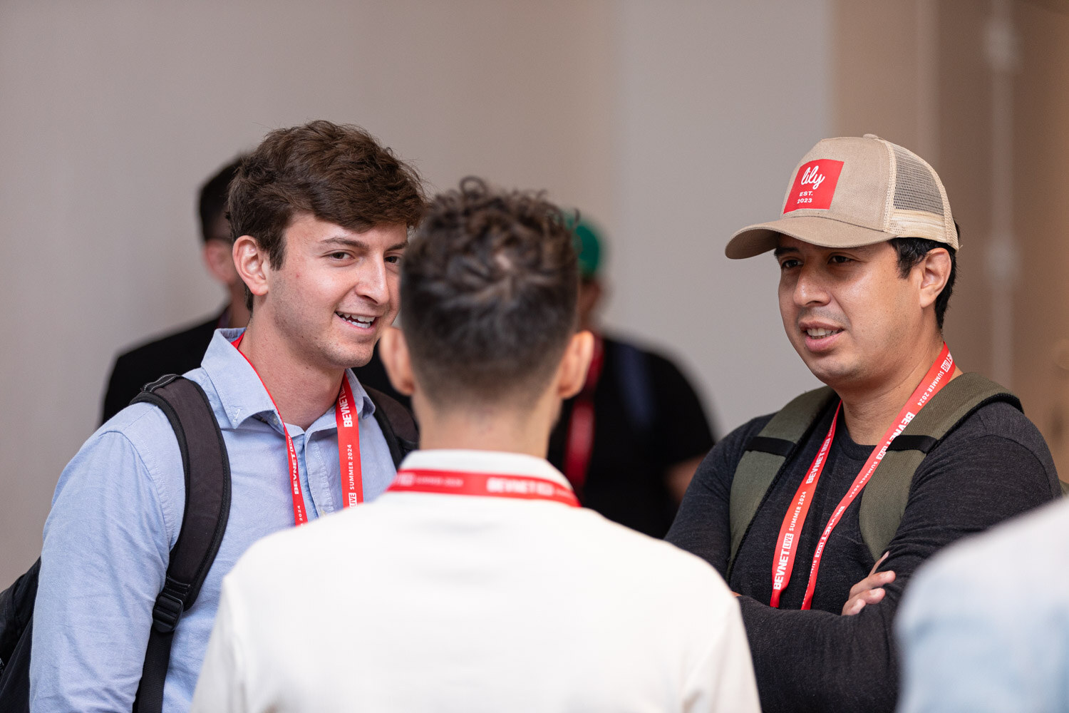 Attendees chat during the morning networking session.