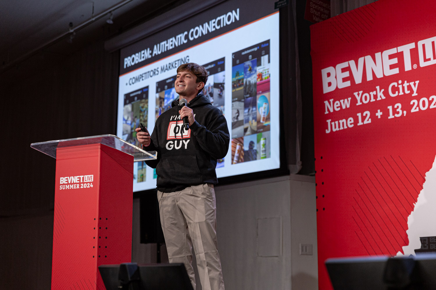 Finalist in an I'm an OK Guy hoodie presents beside a Problem: Authentic Connection slide.