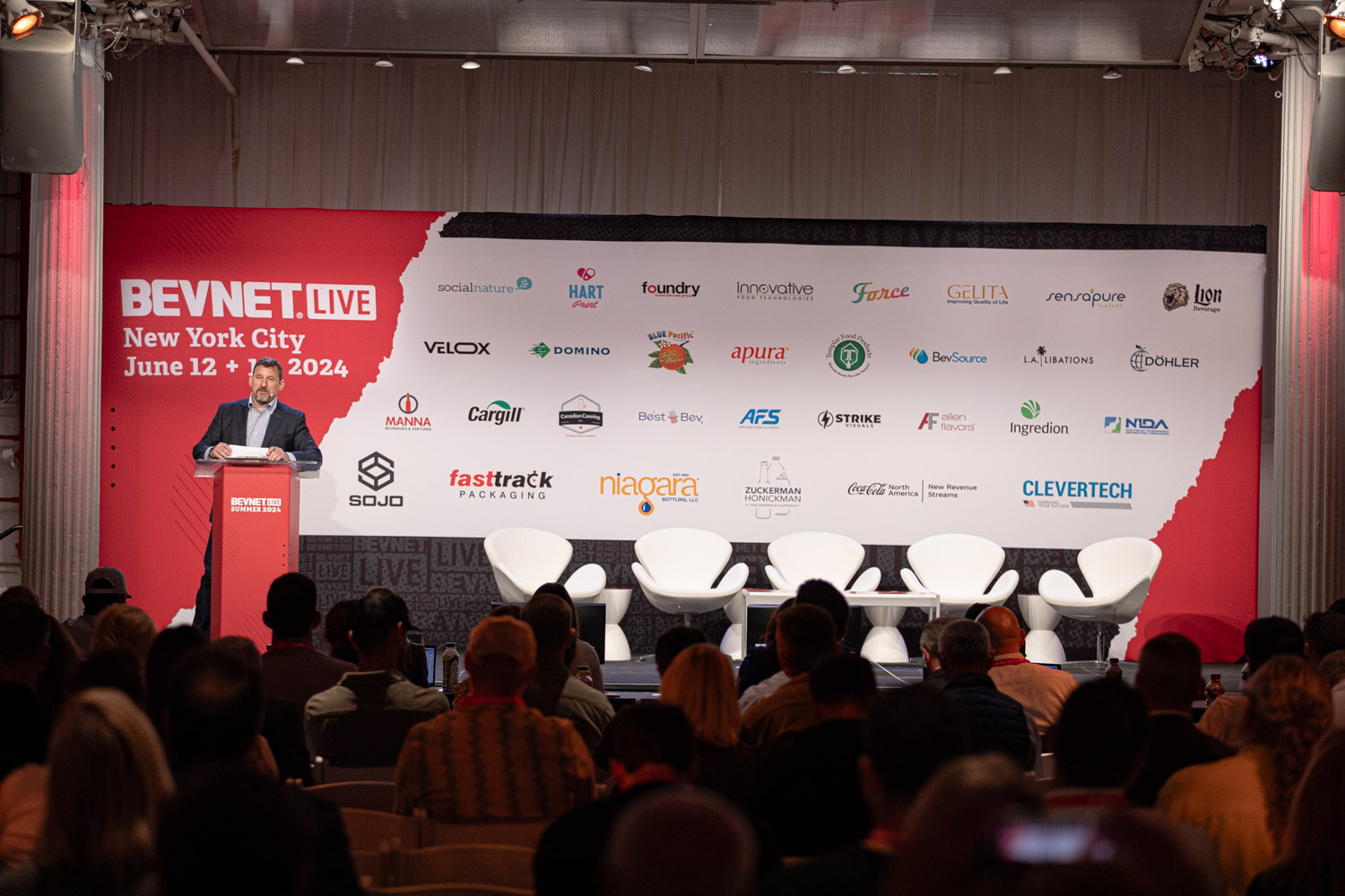 Wide view of the main stage and audience at the opening of BevNET Live Summer 2024.