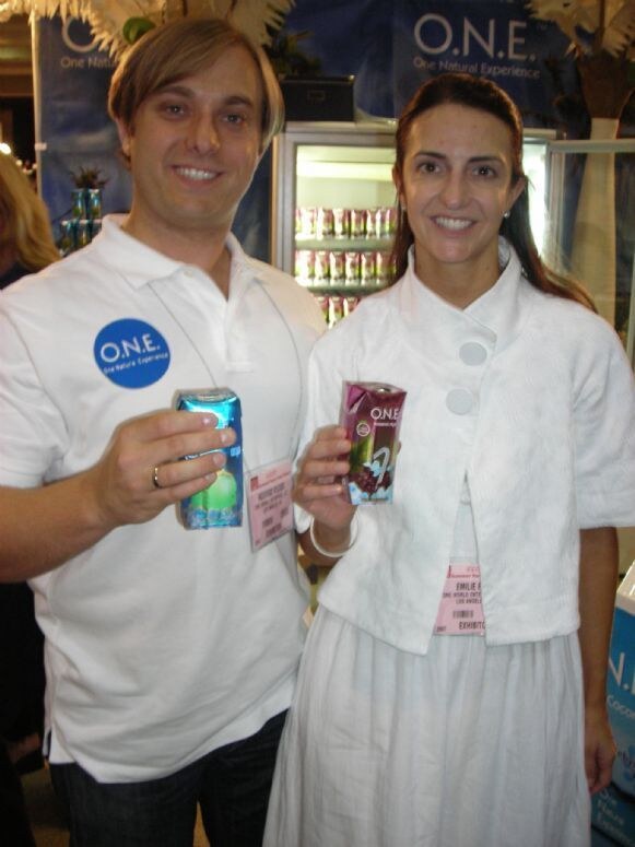 Photo unavailable. Image of Rodrigo and Emilie of O.N.E. at the Summer Fancy Foods 2007 trade show.