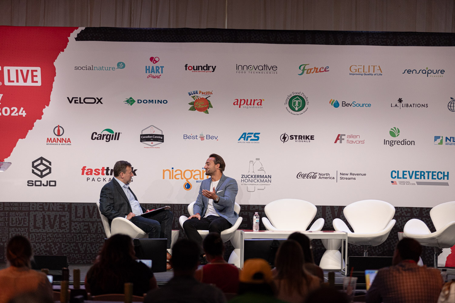 Wide view of the Inside GoPuff conversation on stage with the audience in front.