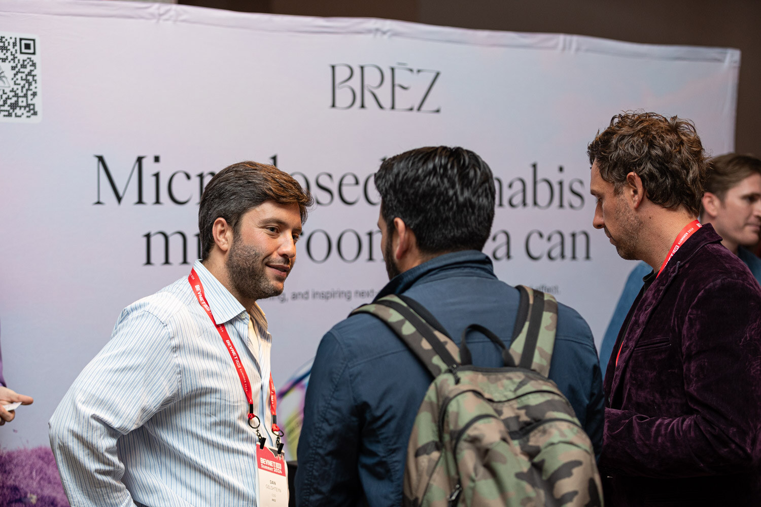 Attendees talk at the Brez booth during the BevNET Live happy hour.