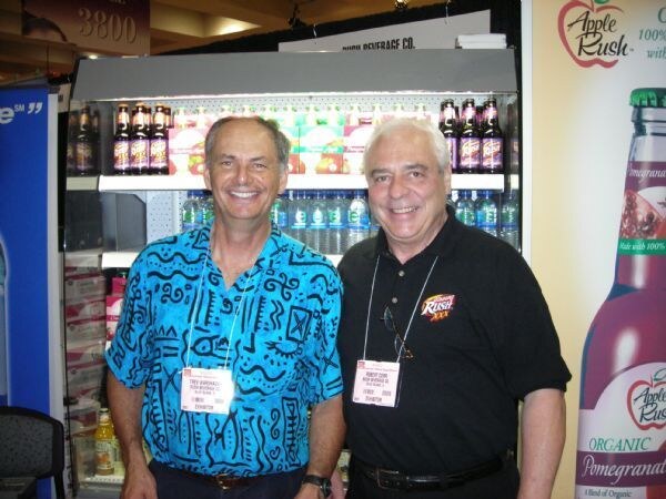 Photo unavailable. Image associated with Trev of Wildfruits and Bob of Rush Beverages at the Summer Fancy Foods 2007 trade show.