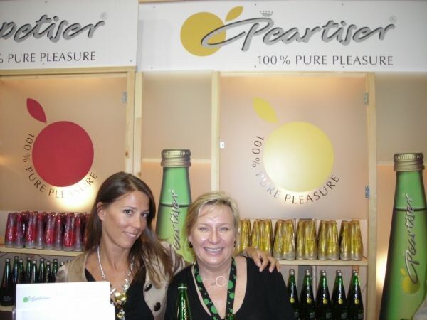 Gaelle Deschamps and Nina Morris of Appletiser at the company's display at Expo East 2007.