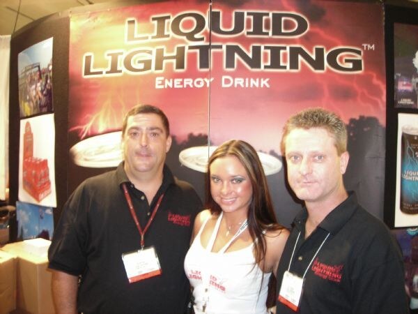 Joe Milano, Monica Snyder and Bill Walsh of Liquid Lightning at the Liquid Lightning display at Expo East 2007. The photo is unavailable, so this is based on the listed names, brand and event.