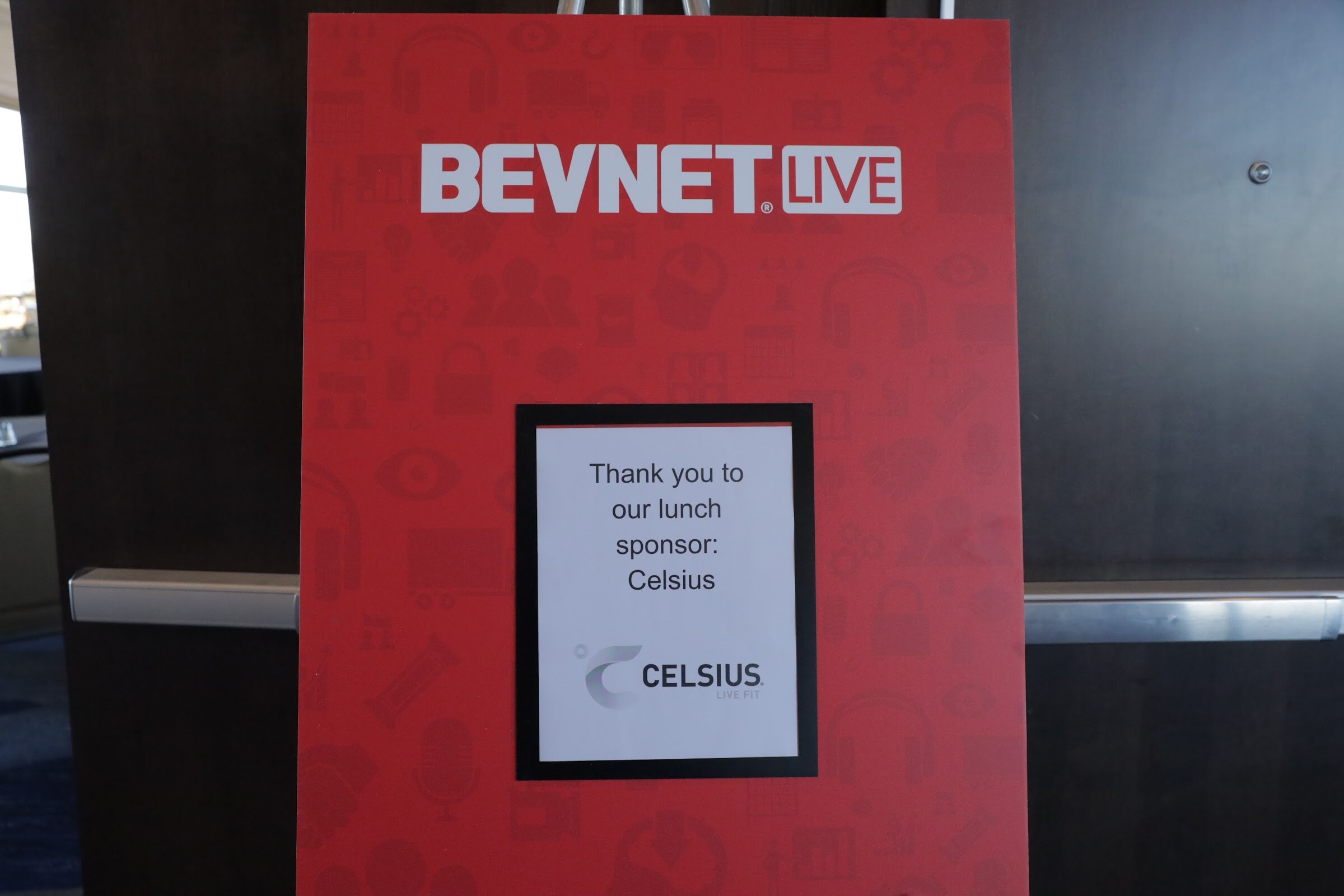 A red sign on an easel reads Thank you to our lunch sponsor and shows the Celsius logo.