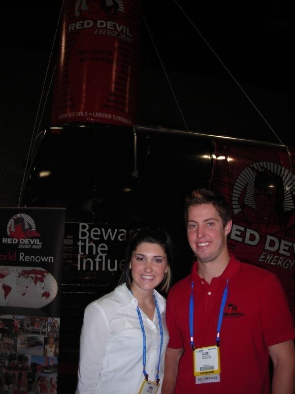 Anna Berman and Scott Schmidt of Red Devil at the Red Devil display at the NACS 2007 trade show. The photo is unavailable, so this is based on the listed people, brand and event.