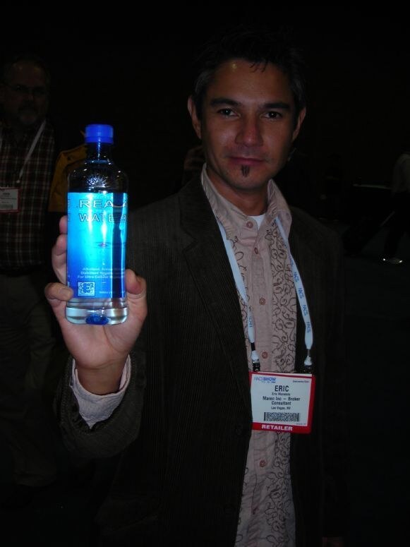 Eric of Real Water at the Real Water display at the NACS 2007 trade show. The photo is unavailable, so this description is based on the listed person, brand and event.