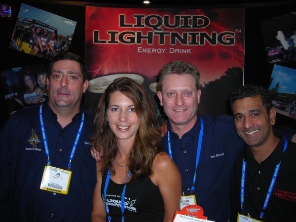 Archived photo from NACS 2007 associated with Joe, Heather, Bill and Riaz of Liquid Lightning. The photo is unavailable, so the scene is not described.