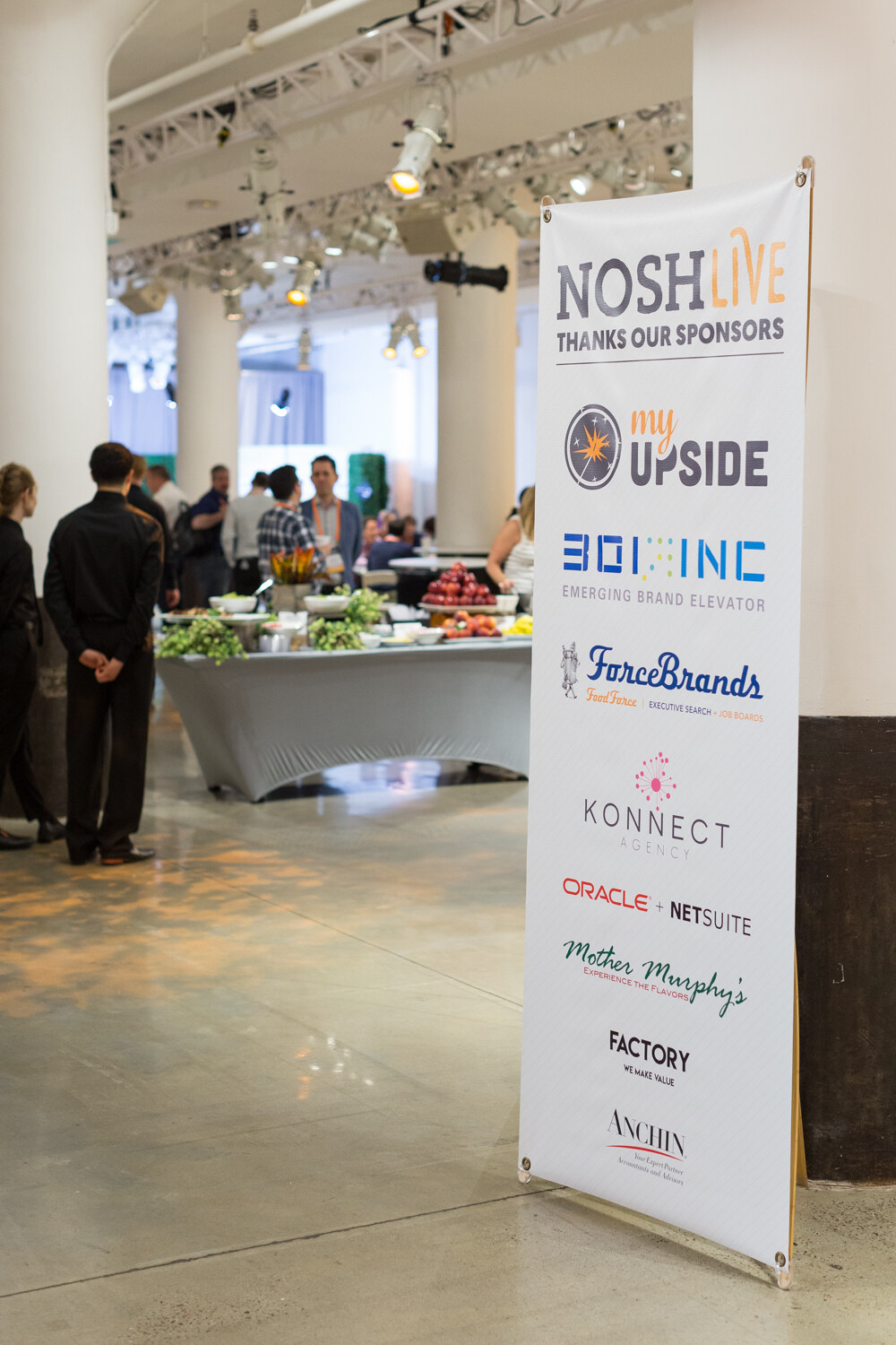 A Nosh Live thanks-our-sponsors standing banner listing My Upside, 301 Inc, ForceBrands, Konnect, Oracle NetSuite, Mother Murphy's, Factory and Anchin.