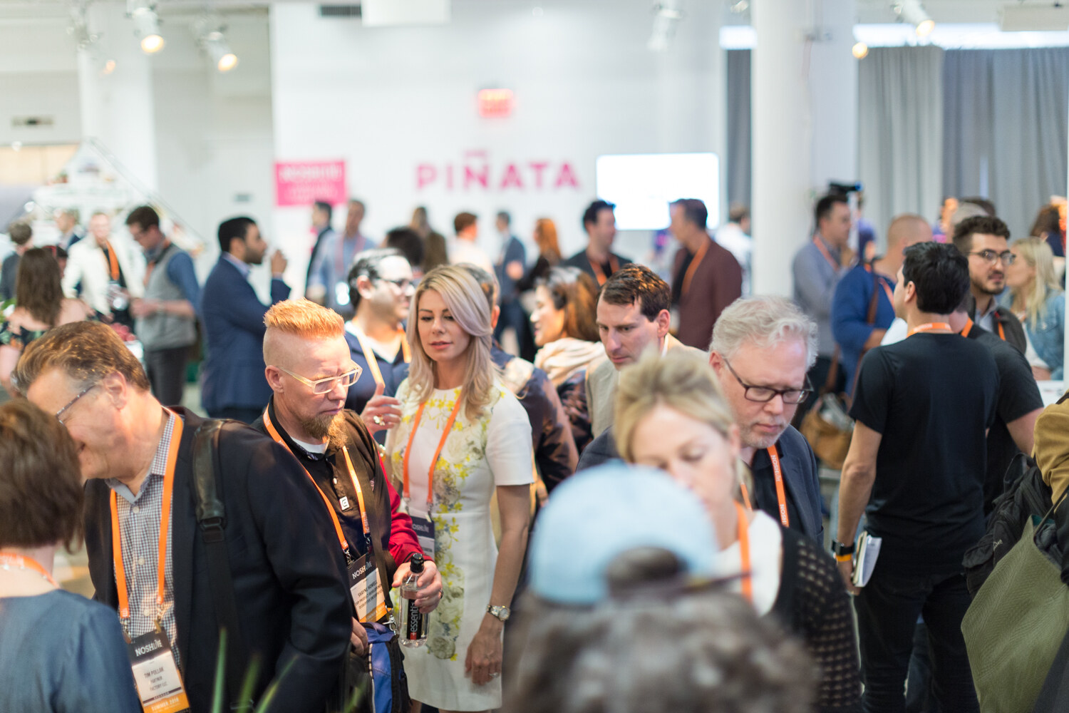 A crowded floor of attendees sampling products at the Sampling Experience and Expo.