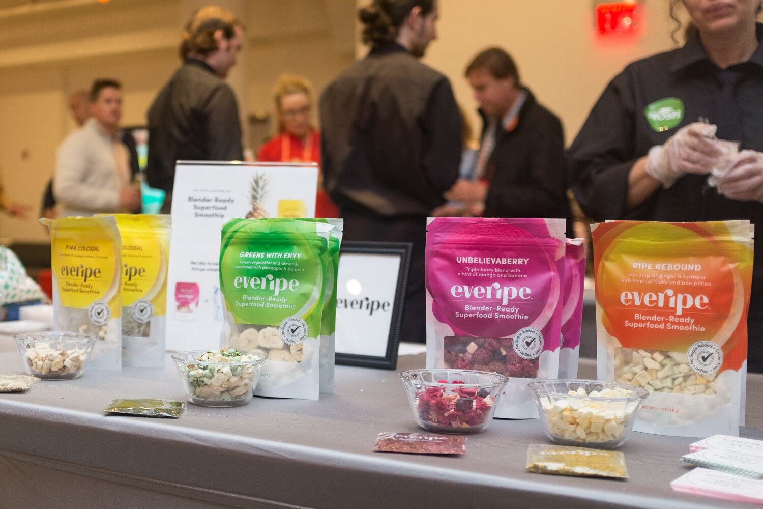 Everipe smoothie pouches beside bowls of freeze-dried fruit samples