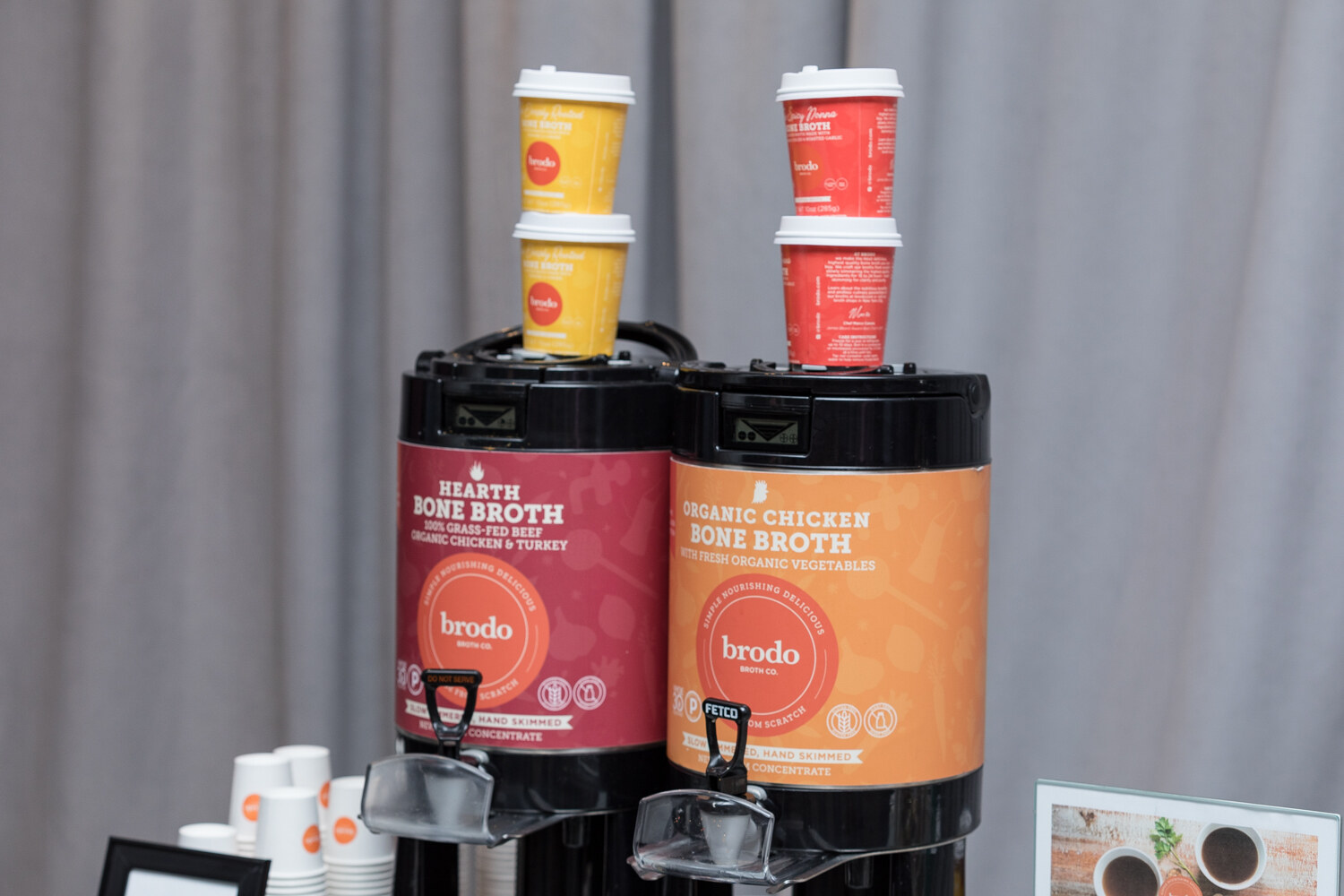 Brodo bone broth dispensers topped with branded cups