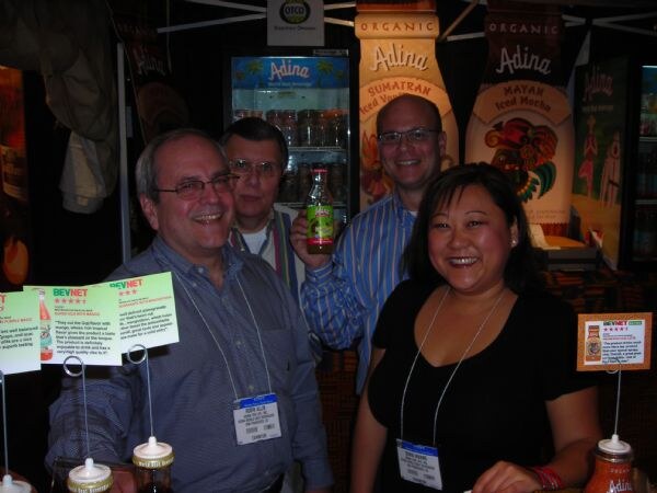 Photo unavailable. Robert Allin, David Britton, Steve Maremont and Sonia Huang of Adina, associated with the Adina exhibit at Winter Fancy Food Show 2008.