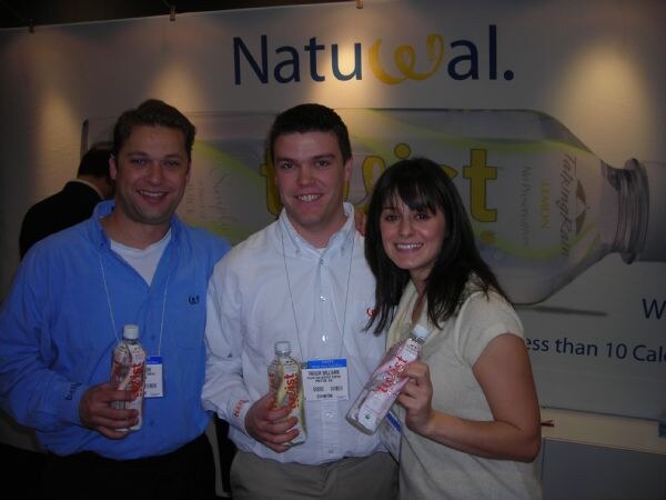 Photo unavailable. Bill, Trevor and Lauren of Talking Rain, associated with the Talking Rain exhibit at Winter Fancy Food Show 2008.