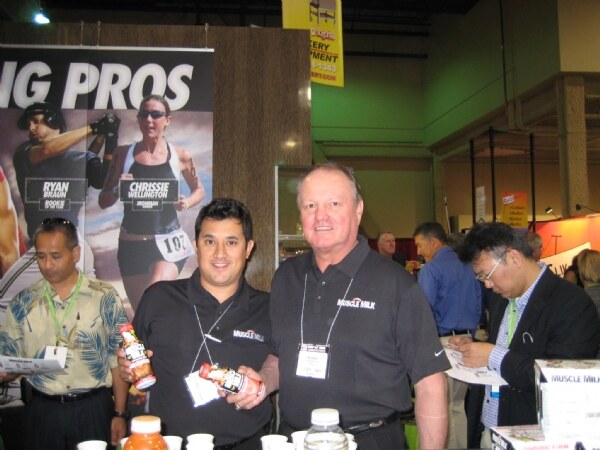 Joe Garza and Tim Wersel of CytoSport, maker of Muscle Milk, at the FMI 2008 trade show.