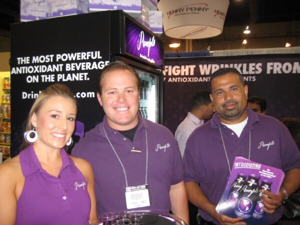 Photo unavailable. Natalie Bloon, Colby Miller and Hector Ruelas of Purple at the FMI 2008 trade show.
