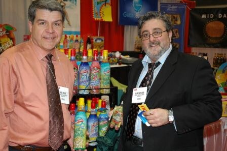 Aldo Geloso, President and Paul H. Rene, US Business Director proudly show their new Mojito mixes and the Toppers line of Daiquiri and Cosmopolitan mixers.