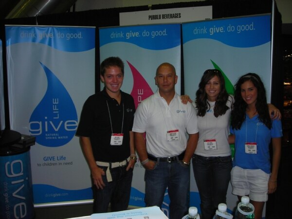 Ben Lewis, Mark Slepak, Eva Lorini and Angela Vranich of Give Water at the Give Water exhibit at NY Fancy Food 2008.