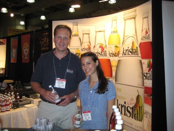 Erik Pearson and Cassidy Leggett of Kristall at the Kristall booth at the NY Fancy Food 2008 trade show.