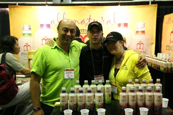 Photo unavailable. Givi Avalishvili, George Peradze and Victoria Avalishvili of Mosse at the Mosse booth at NY Fancy Food 2008.