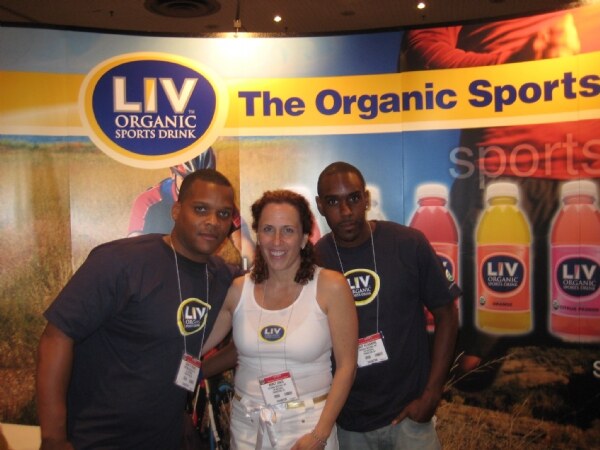 Igor St Phard, Nancy Dince and Dave Alexandre of Liv Organic at the Liv Organic booth at the NY Fancy Food 2008 trade show.