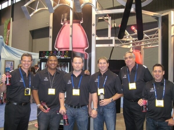 Photo unavailable. Image associated with the Big Earth Brands and Vital Action Water brands at the NACS 2008 trade show; the archive title refers to a team.