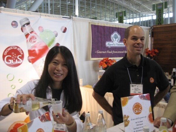 Exhibit photo from Expo East 2008 associated with the Grown Up Soda brand. The image is unavailable, so no further visual detail is described.