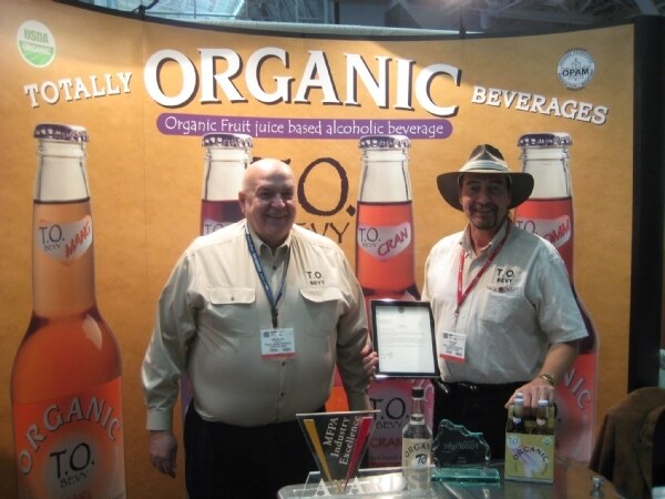 Photo unavailable. Image associated with the Totally Organic Beverages brand at Expo East 2008.