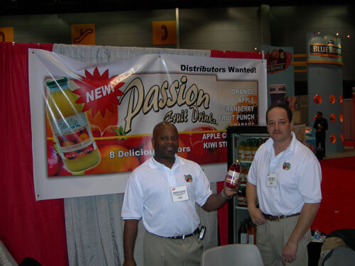 Grover Calvert (left) was busy representing his new company, Passion Fruit Drinks.