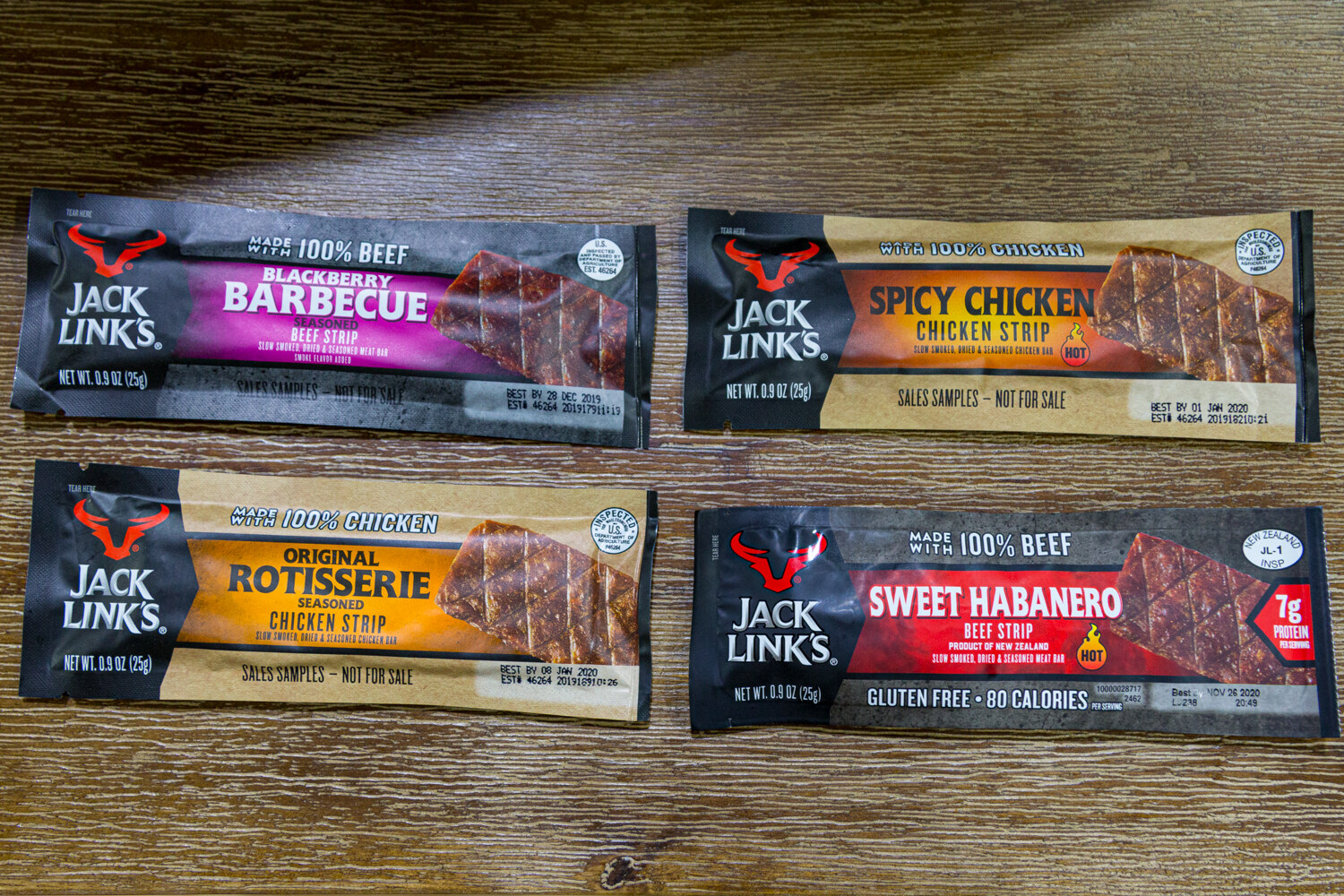 Four Jack Link's sample packs in Blackberry Barbecue, Spicy Chicken, Original Rotisserie and Sweet Habanero.