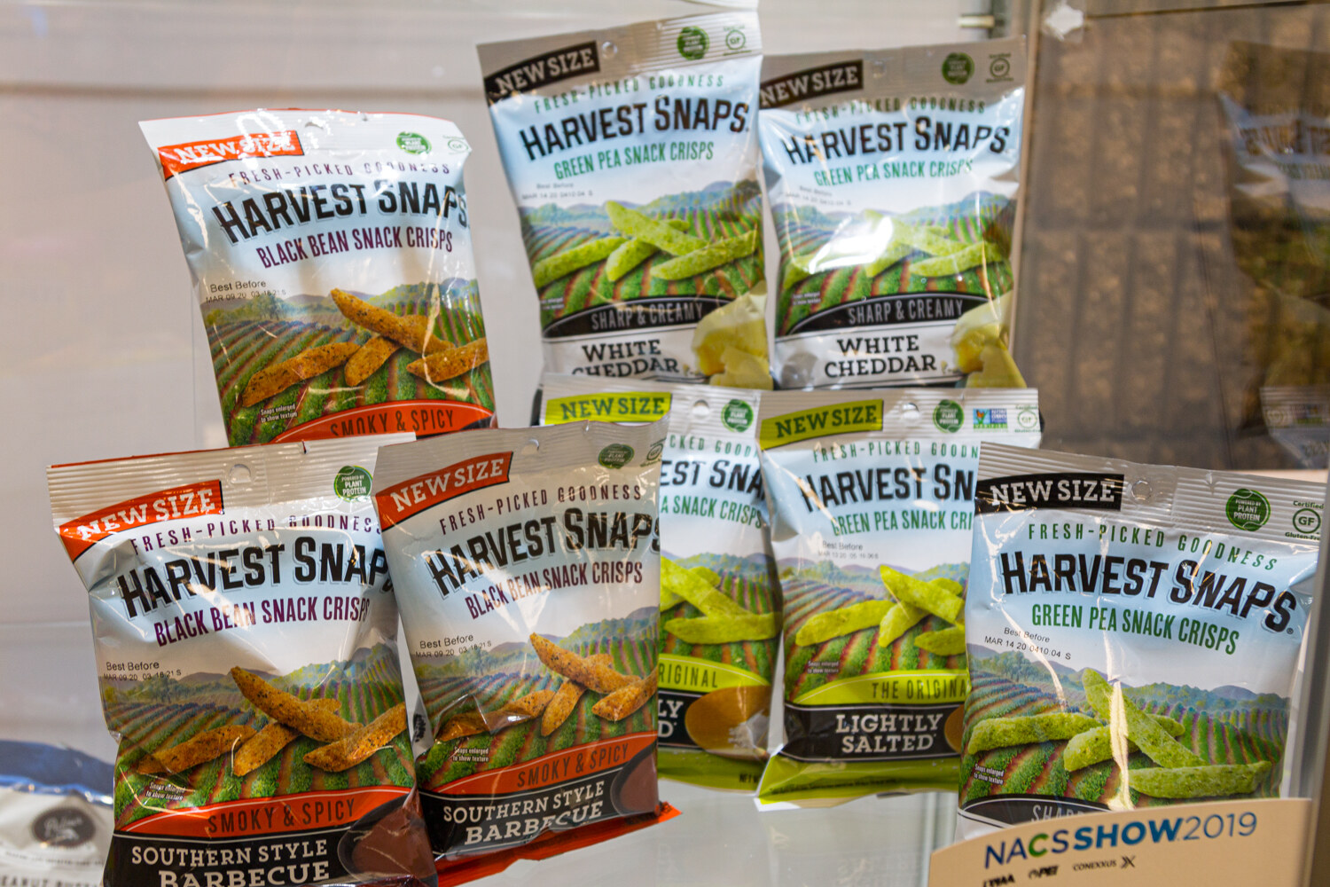 Bags of Harvest Snaps with a NACS Show 2019 plaque at the bottom.