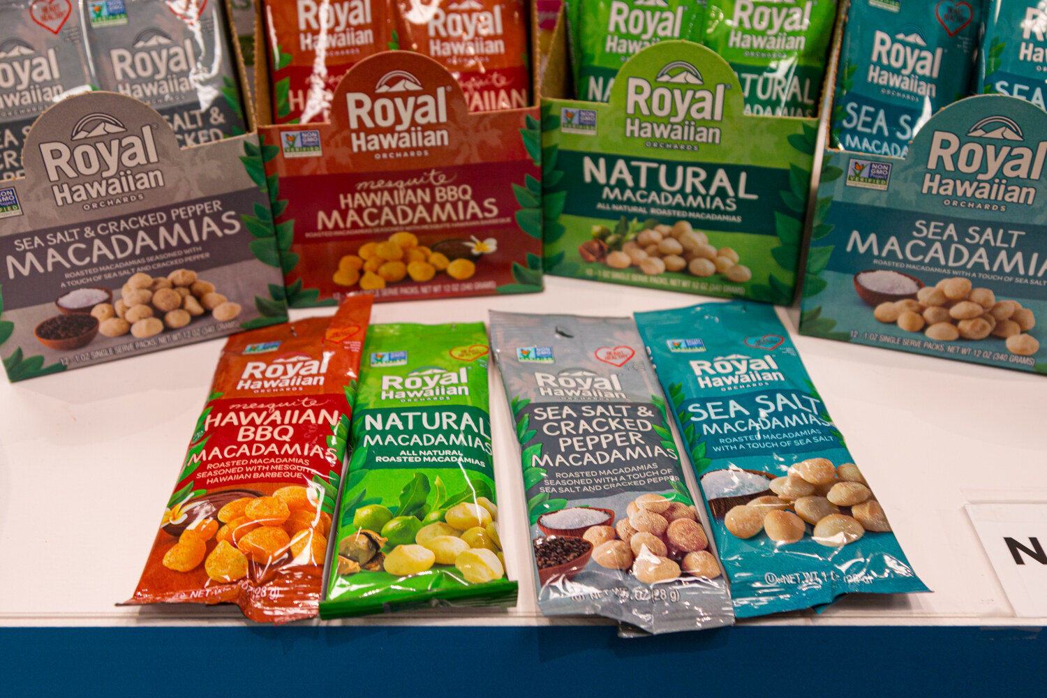 Packs of Royal Hawaiian Macadamias in Hawaiian BBQ, Natural, Sea Salt and Cracked Pepper flavors.