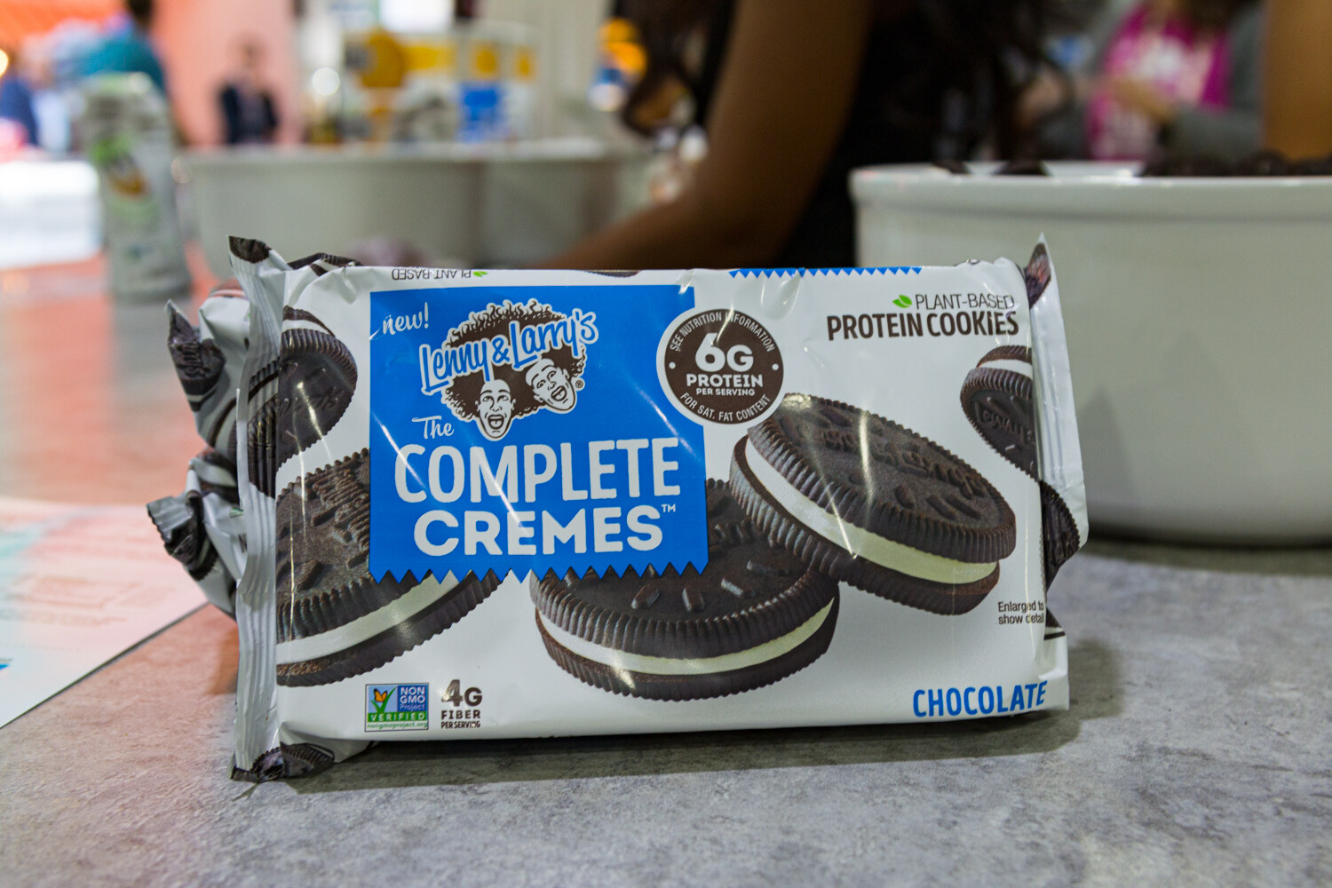 A package of The Complete Cremes sandwich cookies, chocolate flavor.