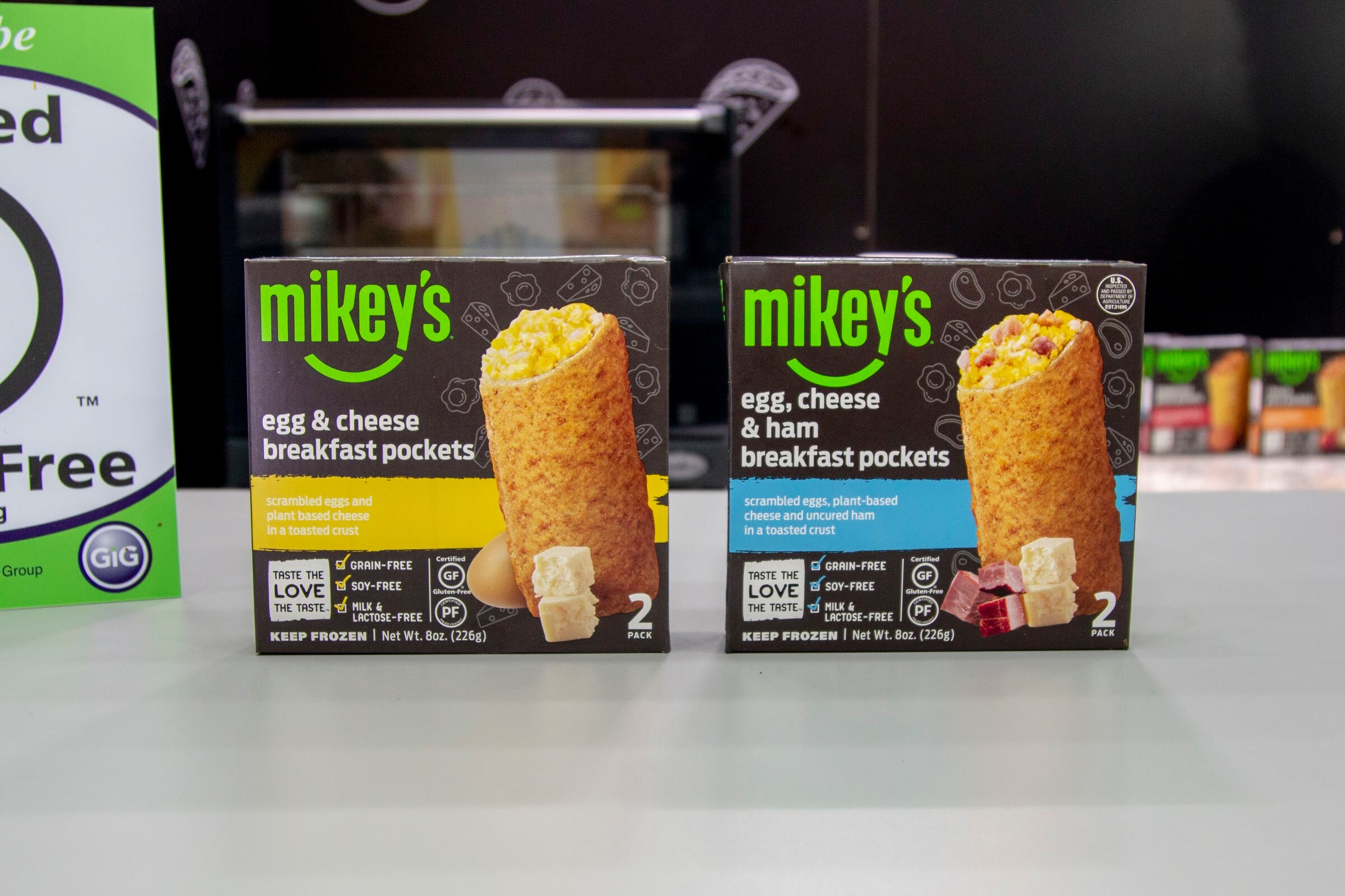 Two boxes of Mikey's breakfast pockets on a white counter.