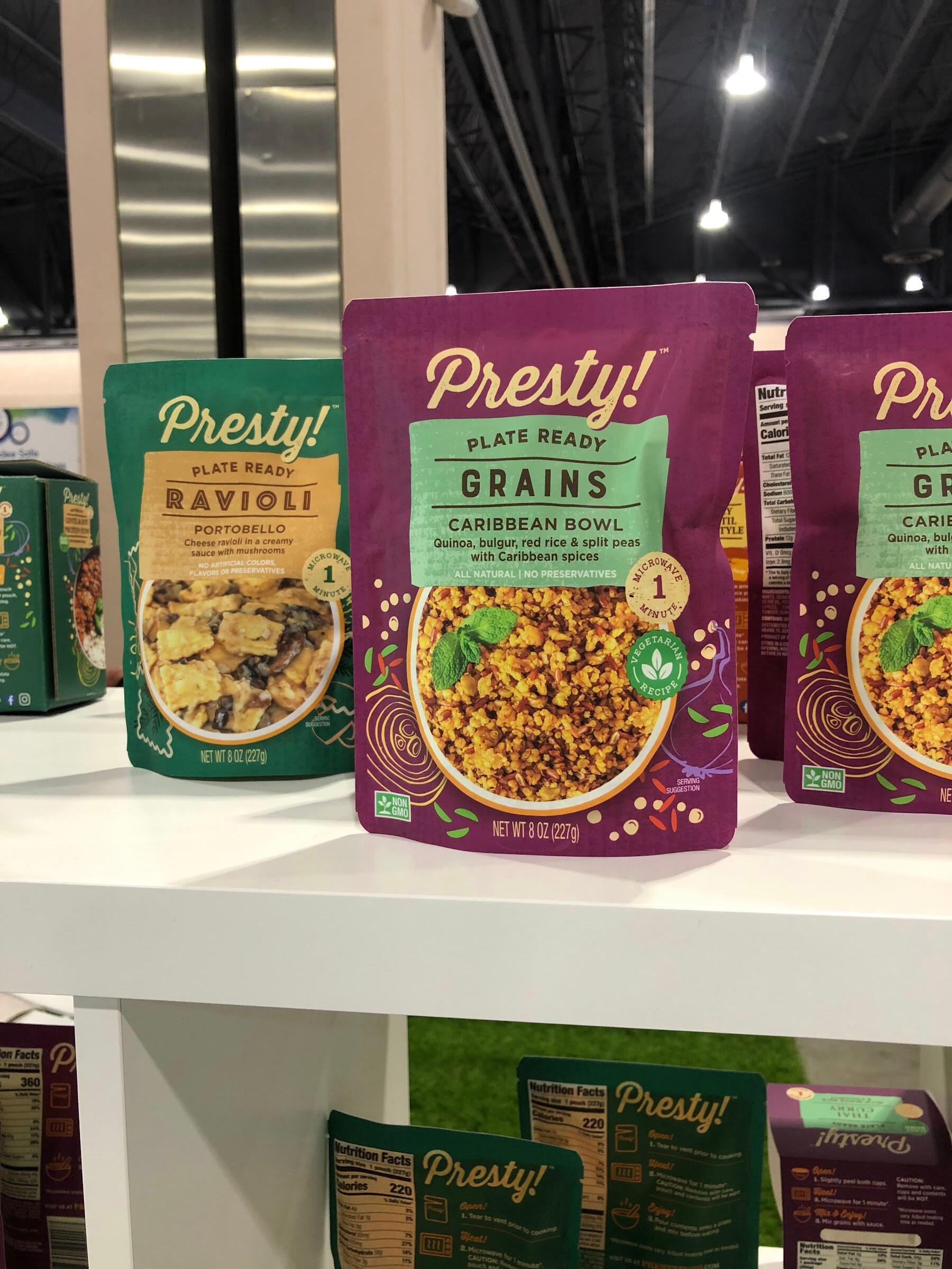Presty plate ready Caribbean Bowl grains and Ravioli pouches on a white shelf