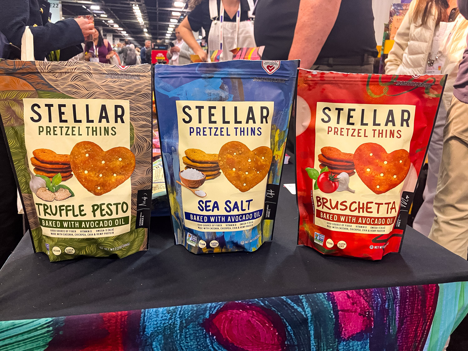 Three bags of Stellar pretzel thins in truffle pesto, sea salt and bruschetta flavors