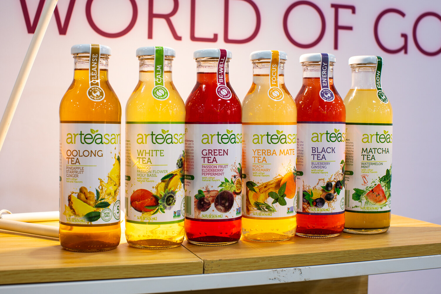 Six bottles of Arteasan teas in oolong, white, green, yerba mate, black and matcha.