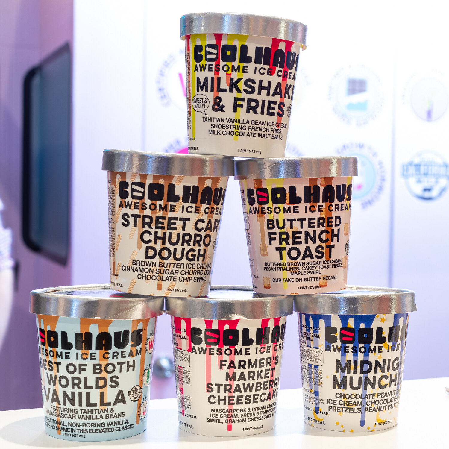 A pyramid of Coolhaus pints with flavors like Street Car Churro Dough.