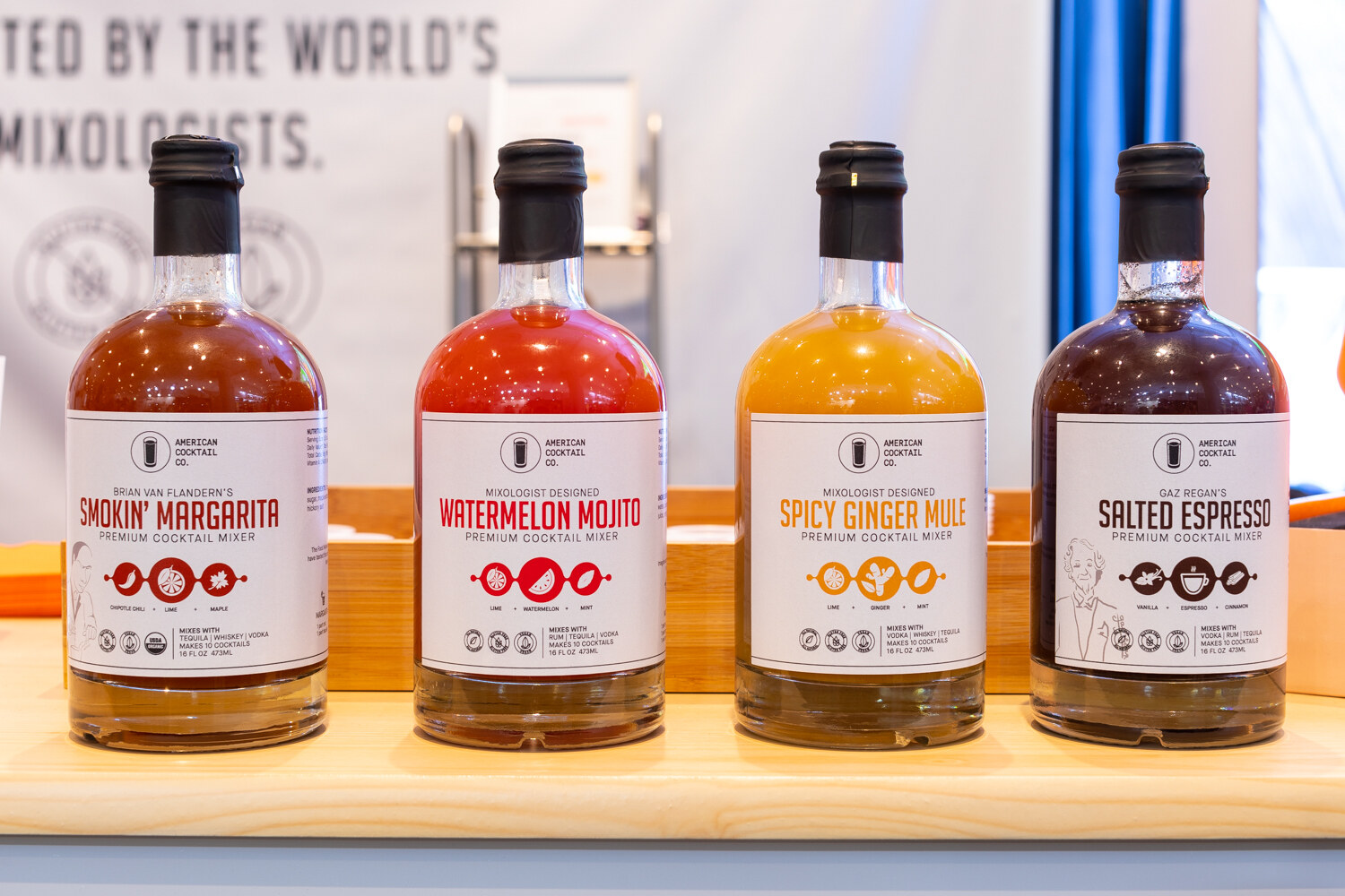 Four bottles of mixers including Smokin' Margarita and Watermelon Mojito.
